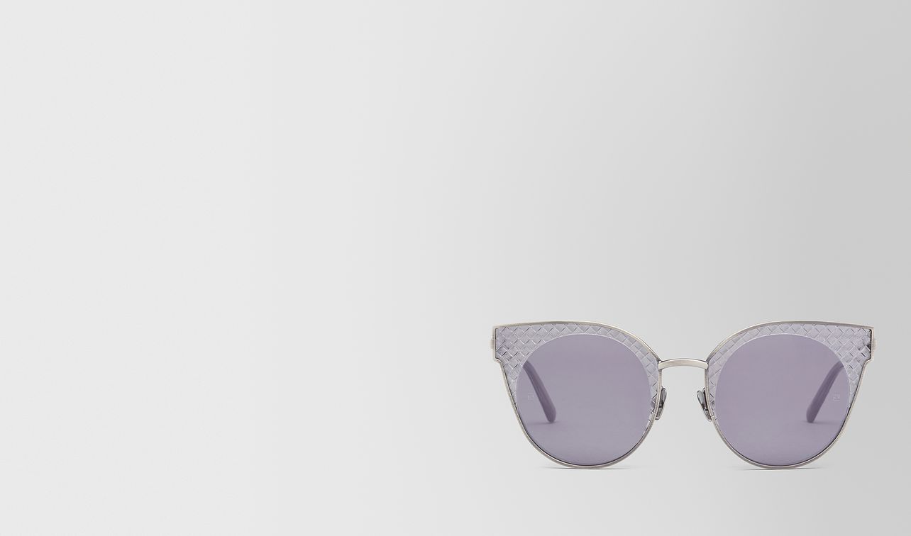 silver metal sunglasses landing