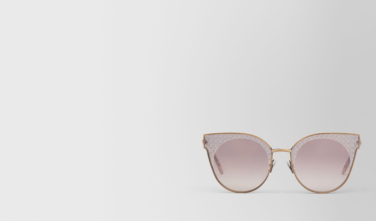 bronze metal sunglasses landing