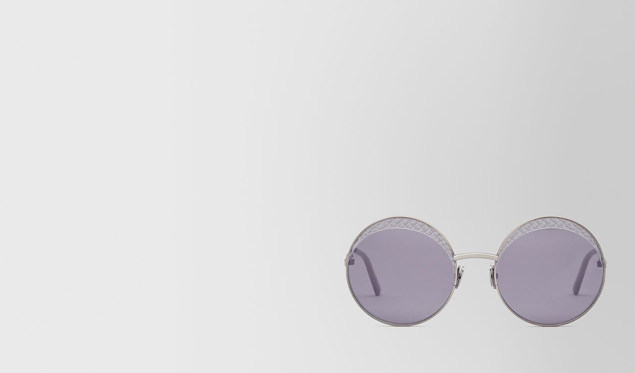 silver metal sunglasses landing