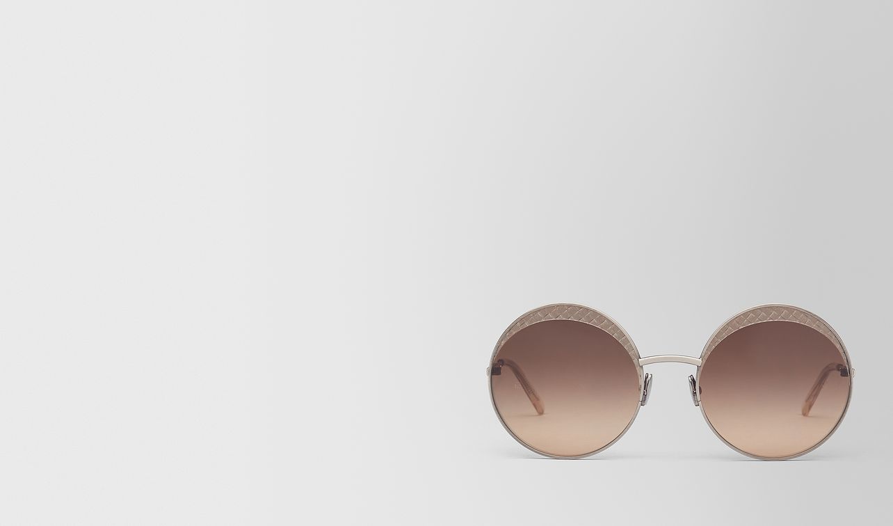 silver metal sunglasses landing