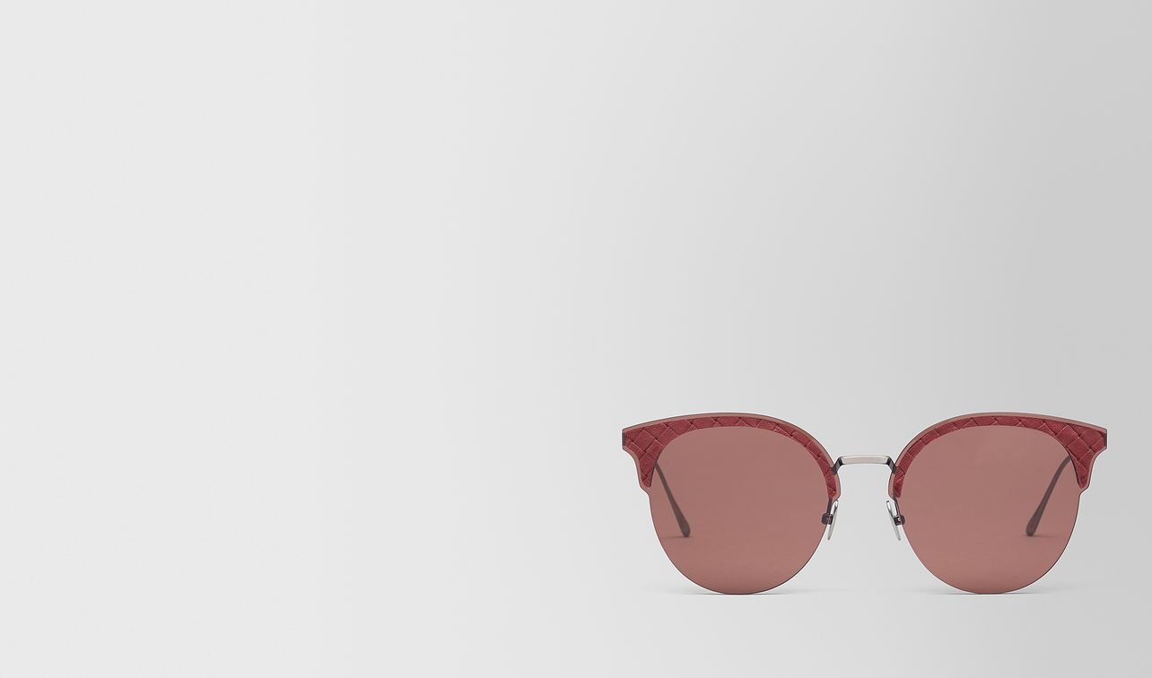 red metal sunglasses landing