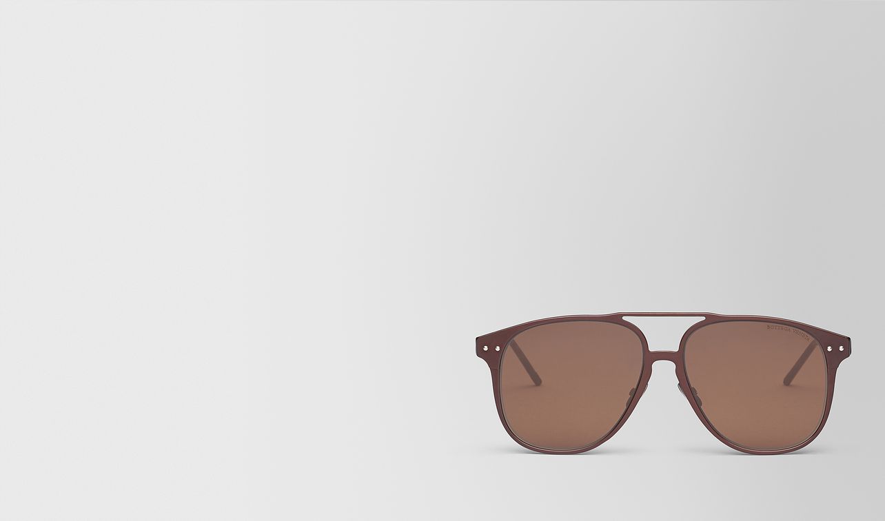brown aluminum sunglasses landing