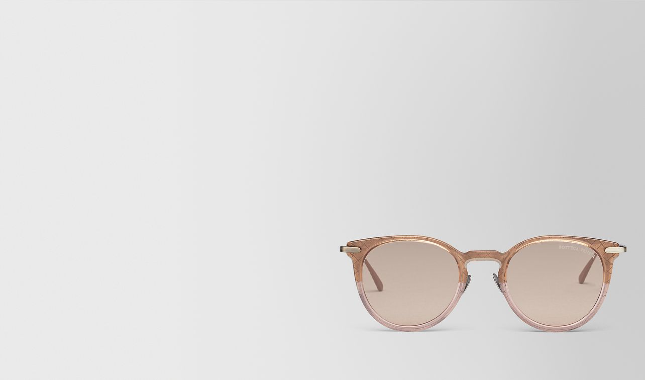 brown metal sunglasses landing