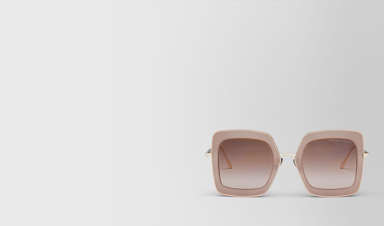 brown metal sunglasses landing