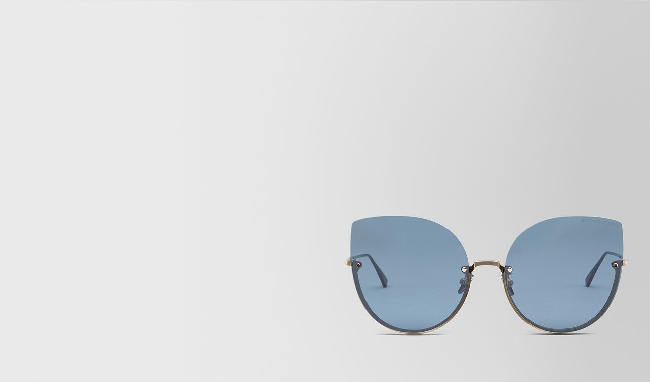 gold metal sunglasses landing