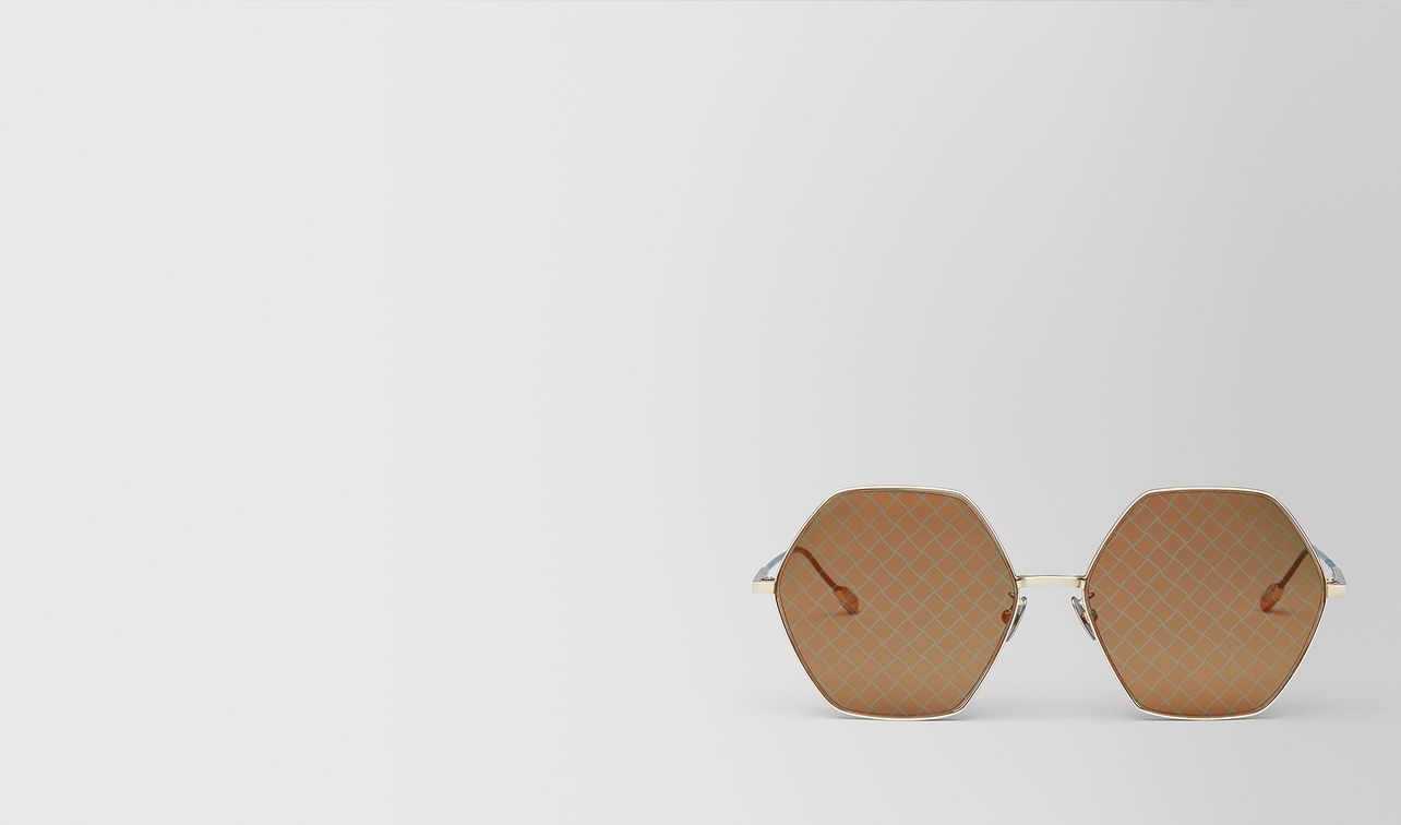 gold metal sunglasses landing